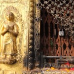 2014.12.10 Kathmandu 26 Swayambhunath Statue locked ResizeBy Donna Yates CC BY-NC-SA